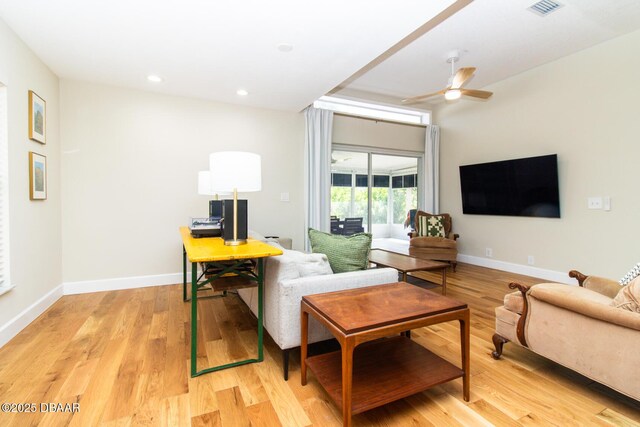1327 Wayne Ave, New Smyrna Beach, FL 32168 - living room with light wood-style flooring, a ceiling fan, and recessed lighting