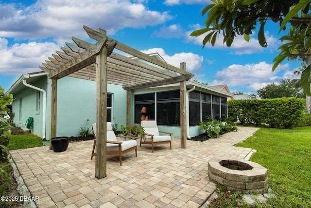 1327 Wayne Ave, New Smyrna Beach, FL 32168 - view of patio / terrace featuring a sunroom, a fire pit, and a pergola