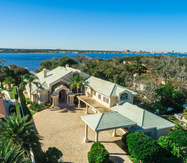 birds eye view of property featuring a water view