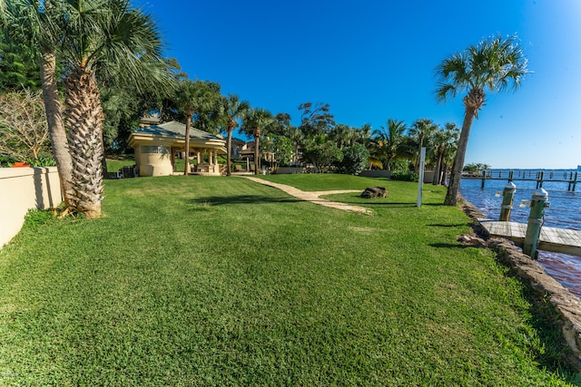 view of yard with a gazebo and a water view