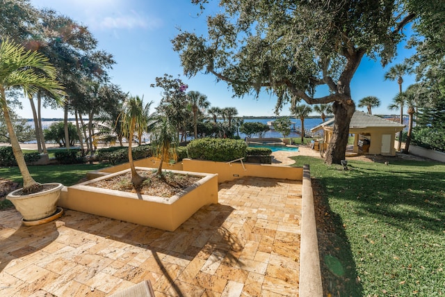 view of patio / terrace with a water view