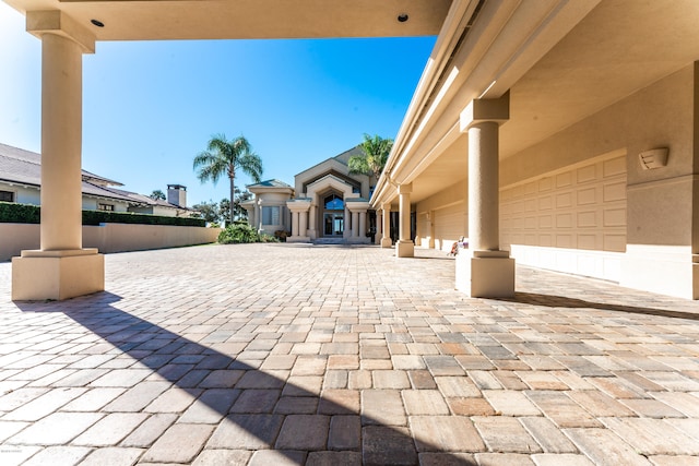 view of patio / terrace with a garage