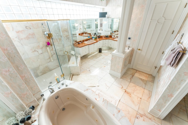 bathroom featuring vanity and shower with separate bathtub