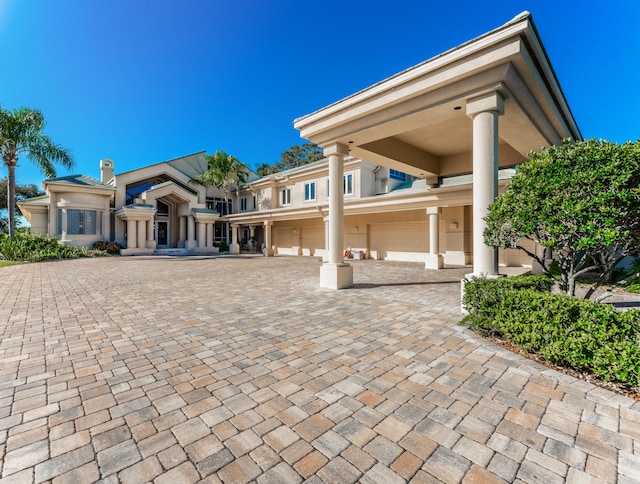 view of front of property featuring a garage