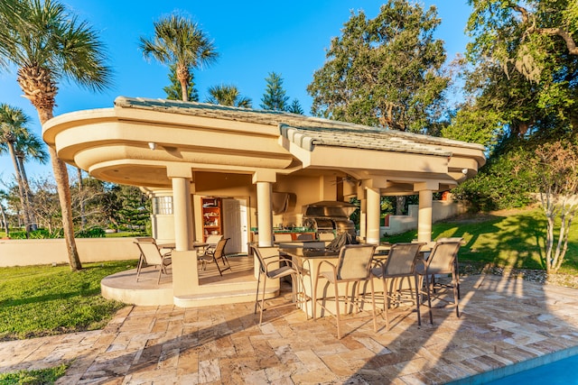 view of patio featuring a bar