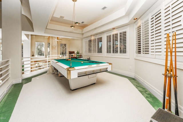 game room featuring carpet flooring, pool table, and a tray ceiling