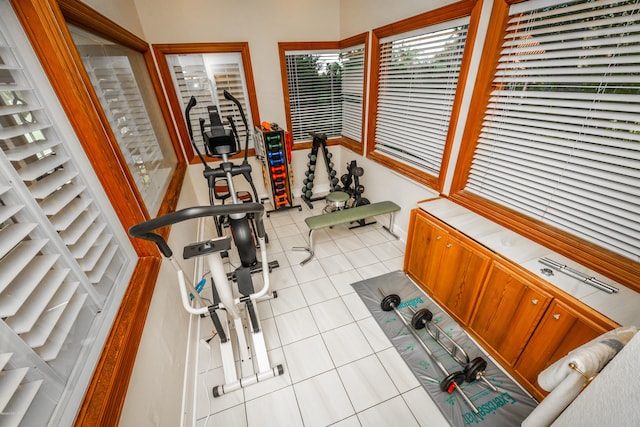 exercise area with light tile patterned floors