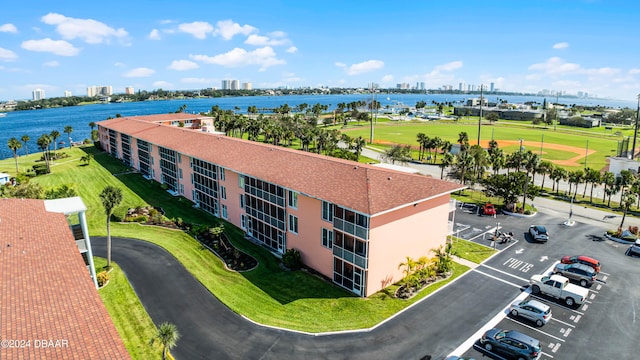 drone / aerial view with a water view