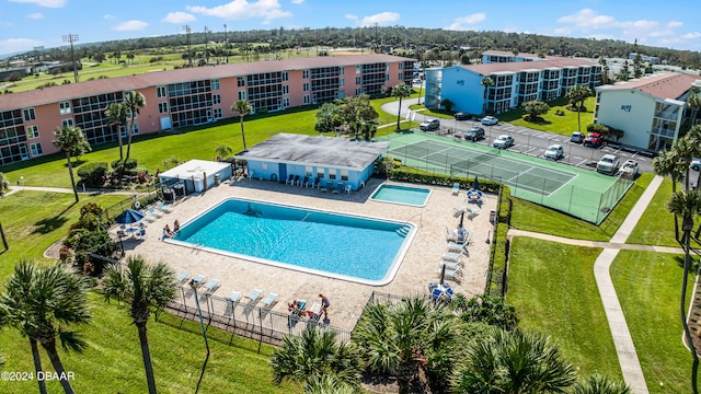 view of pool featuring a yard and a patio area