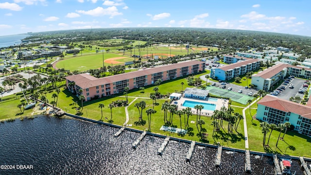 birds eye view of property featuring a water view