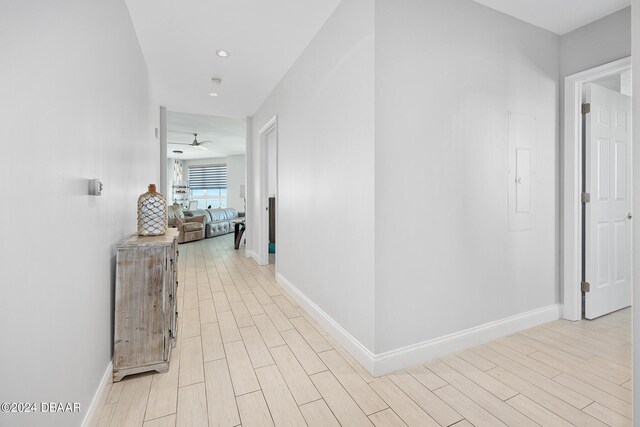 corridor featuring light hardwood / wood-style flooring