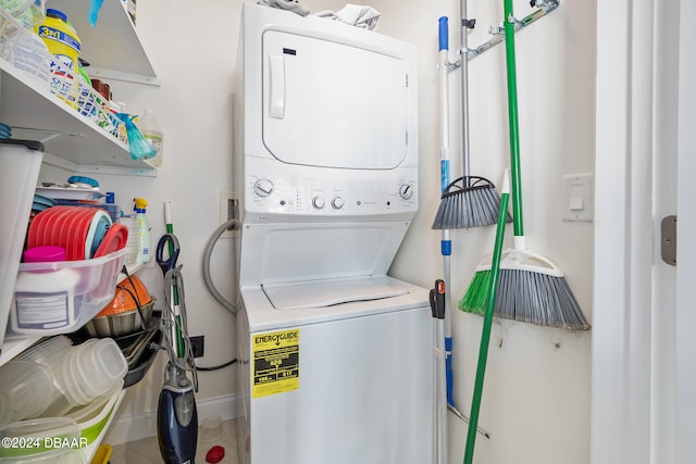 laundry area featuring stacked washing maching and dryer