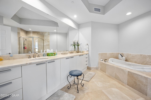 bathroom with vanity, tile patterned floors, and independent shower and bath