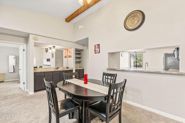 1 Tomoka Oaks Blvd Unit 112, Ormond Beach, FL 32174 - dining room featuring light colored carpet and baseboards