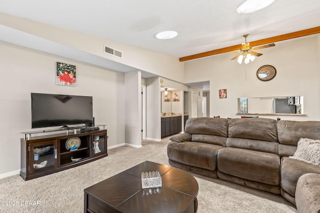 1 Tomoka Oaks Blvd Unit 112, Ormond Beach, FL 32174 - living room featuring carpet, baseboards, and ceiling fan