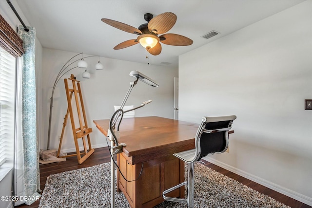 office area featuring dark hardwood / wood-style flooring and ceiling fan