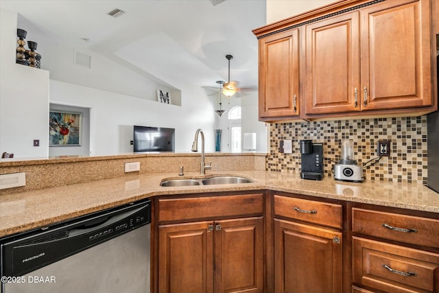 kitchen with sink, stainless steel dishwasher, ceiling fan, and decorative backsplash