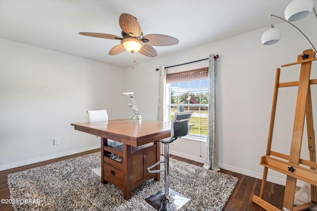 office space featuring dark wood-type flooring and ceiling fan