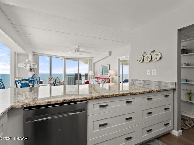 kitchen featuring dishwashing machine, ceiling fan, white cabinets, light stone counters, and dark wood-type flooring