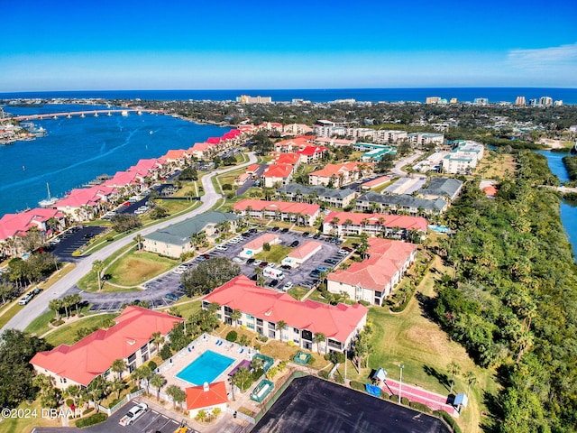 birds eye view of property featuring a water view