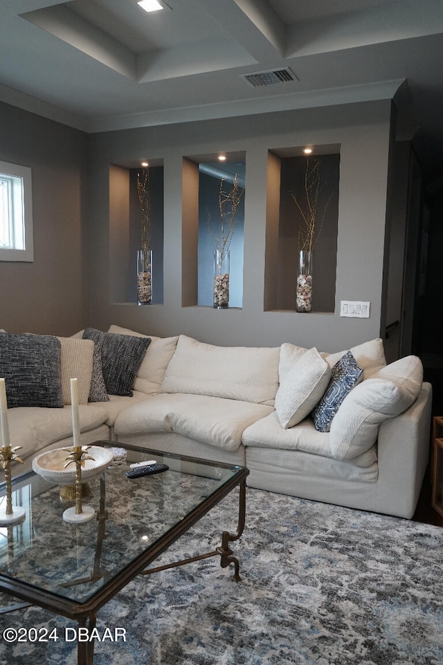 living room with ornamental molding