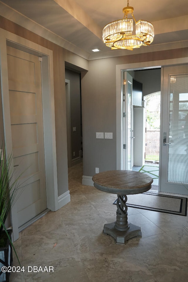 entrance foyer with an inviting chandelier