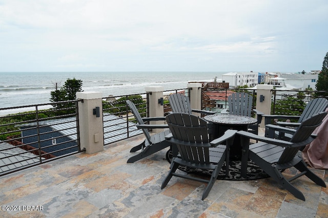 view of patio / terrace featuring a water view