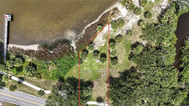 1146 Riverside Dr, Holly Hill, FL 32117 - patio terrace at dusk with a fenced backyard, an outdoor structure, and outdoor dining area