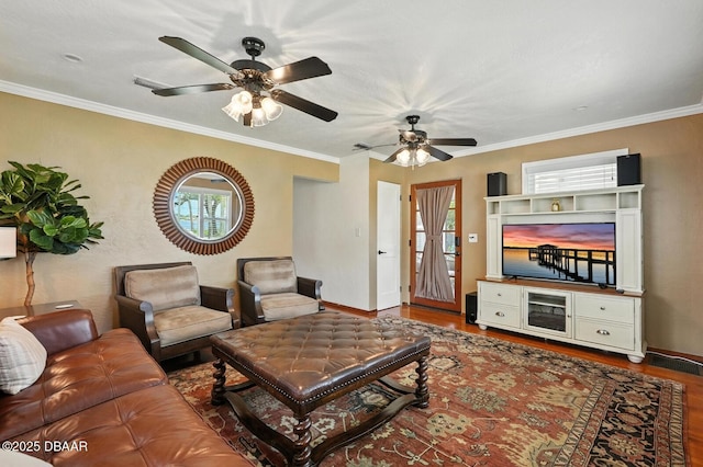 1146 Riverside Dr, Holly Hill, FL 32117 - living area with wood finished floors, a ceiling fan, and crown molding