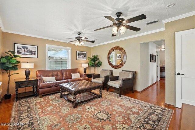 1146 Riverside Dr, Holly Hill, FL 32117 - kitchen with appliances with stainless steel finishes, ornamental molding, light tile patterned floors, tasteful backsplash, and brown cabinetry