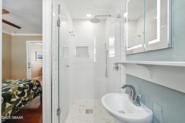 1146 Riverside Dr, Holly Hill, FL 32117 - bathroom with a shower stall and crown molding