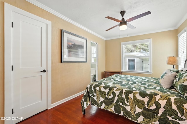1146 Riverside Dr, Holly Hill, FL 32117 - bedroom featuring dark wood-style floors, ornamental molding, a ceiling fan, and ensuite bath