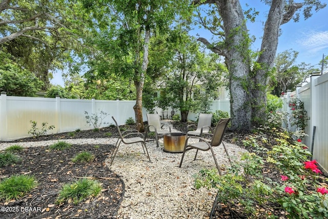 1146 Riverside Dr, Holly Hill, FL 32117 - fenced backyard featuring a patio area