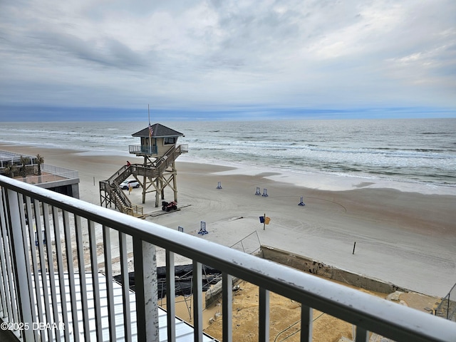 view of water feature with a beach view