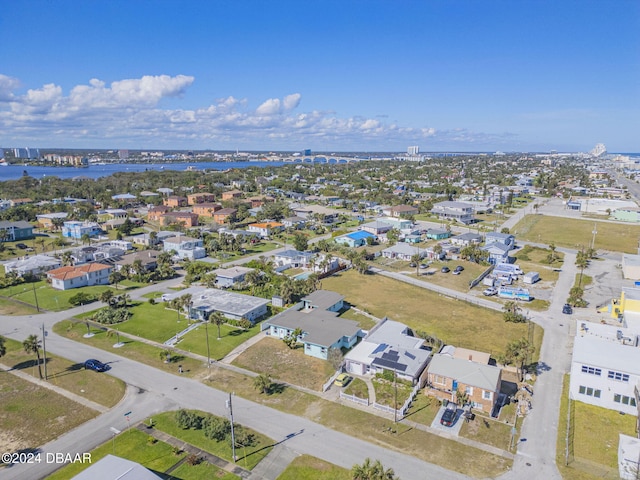 birds eye view of property featuring a residential view and a water view