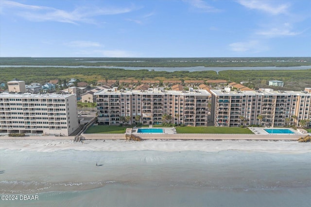 bird's eye view with a view of the beach and a water view