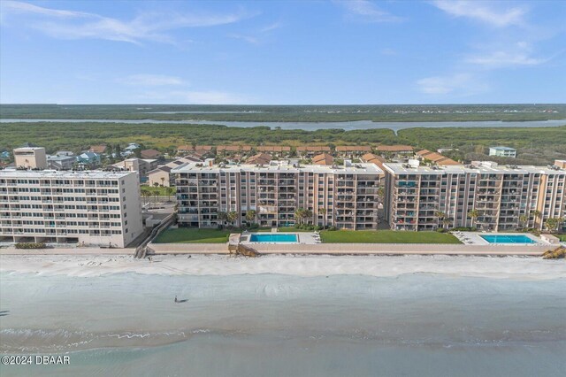 4445 S Atlantic Ave Unit 606, Ponce Inlet, FL 32127 - bird's eye view of a nearby body of water, a pool, and apartment complex