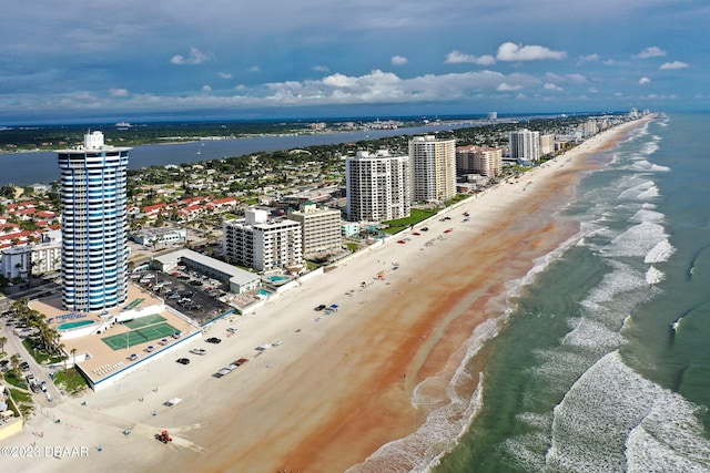 bird's eye view featuring a beach view and a water view