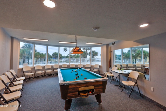 playroom with a textured ceiling, carpet floors, and billiards