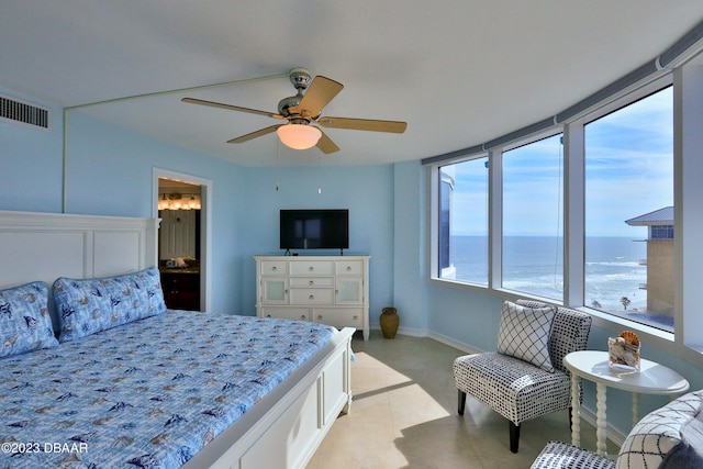 bedroom with ceiling fan and light tile patterned floors