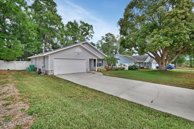 single story home with fence, driveway, a front lawn, and a garage