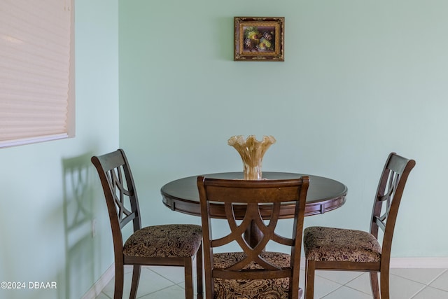 dining area featuring light tile patterned floors