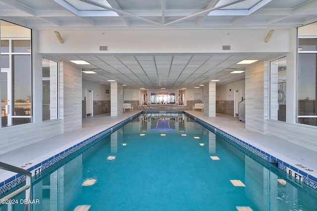 view of pool with a skylight