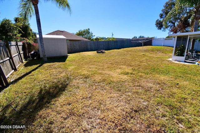 view of yard with a shed