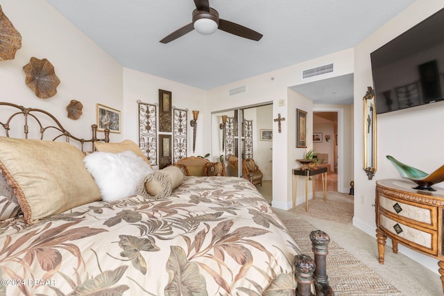231 Riverside Dr Unit 1803-1, Daytona Beach, FL 32117 - bedroom featuring light colored carpet, a closet, a ceiling fan, and baseboards