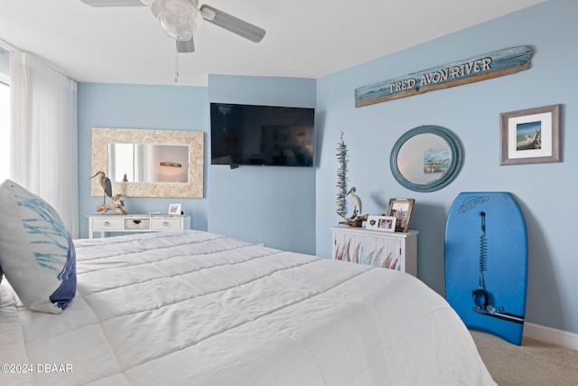 231 Riverside Dr Unit 1803-1, Daytona Beach, FL 32117 - carpeted bedroom featuring ceiling fan, baseboards, and multiple windows