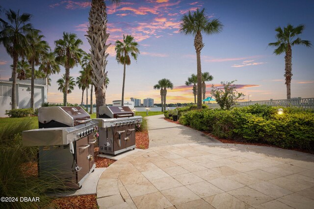 231 Riverside Dr Unit 1803-1, Daytona Beach, FL 32117 - view of community featuring a patio area