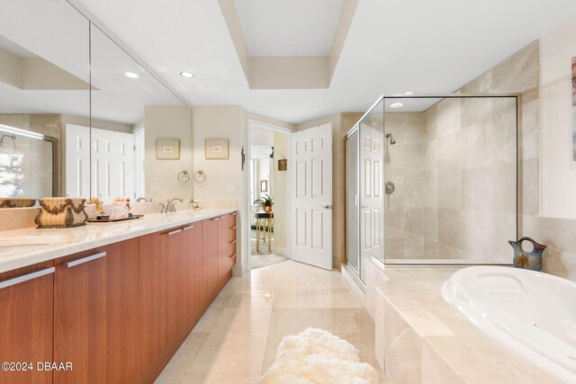 231 Riverside Dr Unit 1803-1, Daytona Beach, FL 32117 - full bathroom with a shower stall, a garden tub, double vanity, and recessed lighting