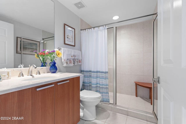 231 Riverside Dr Unit 1803-1, Daytona Beach, FL 32117 - full bath with toilet, a shower stall, tile patterned flooring, and vanity