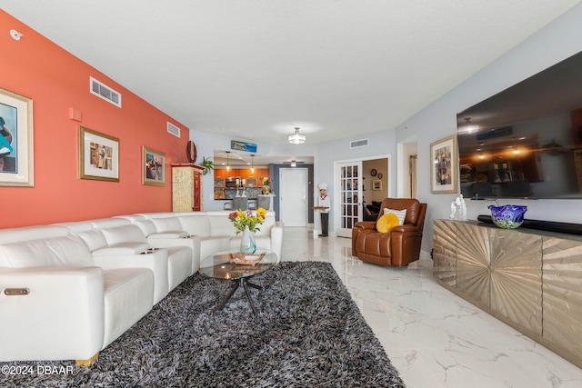 231 Riverside Dr Unit 1803-1, Daytona Beach, FL 32117 - living room featuring marble finish flooring